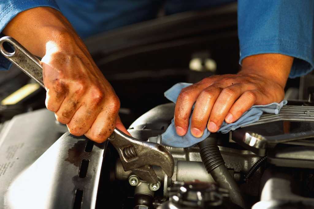 mechanic wrench fix engine repair